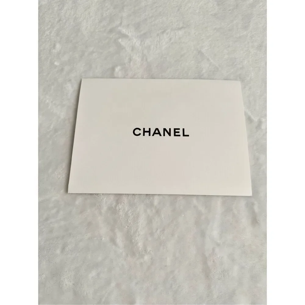 ￼ Chanel card sleeve - black and white